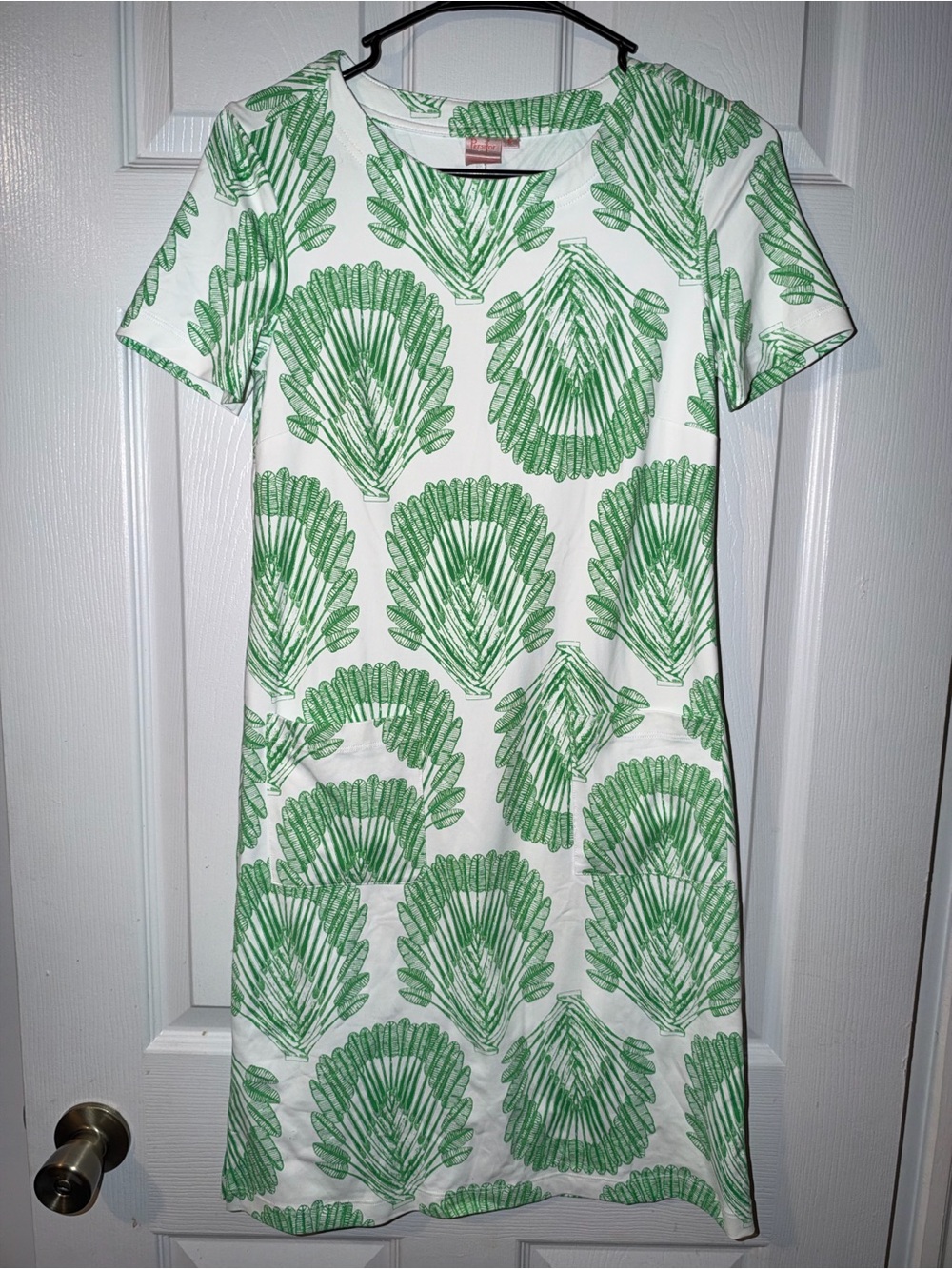 Persifor shift dress featuring a green and white tropical palm print